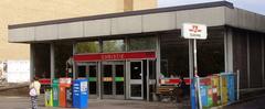 Entrance to Christie subway station in Toronto with modern design and glass doors