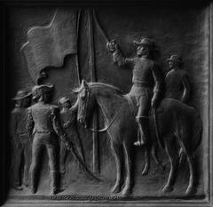 Close-up details of a bronze door with intricate designs at Los Angeles City Hall