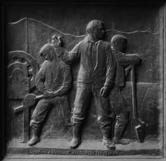 Close-up details of a bronze door with intricate metalwork at Los Angeles City Hall