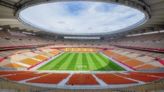 Estadio de La Cartuja in Seville stadium exterior with blue sky