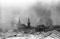 View east from roof at 3 Jan Kiliński Street during Warsaw Uprising showing bell towers of St Hyacinth's Church and Holly Ghost Church