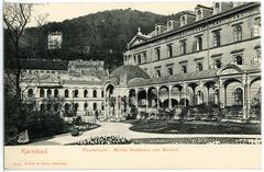 Historic black and white photo of Karlsbad Wandelhalle, Militärbadehaus, and Neubad buildings in 1904