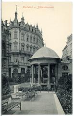 Historic Schlossbrunnen fountain in Karlsbad in 1913 with detailed sculpture