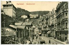 Historic black and white photograph of Karlsbad's Marktbrunnen fountain area with people around in 1906