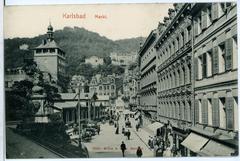 Historic 1907 Karlsbad market square with people and old buildings