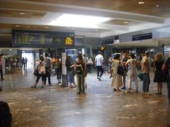 Western concourse of Toulouse Matabiau railway station with modern architectural elements and passenger walkways