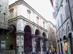 Facade of Loggia della Mercanzia in Siena, Italy