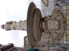 Detail of Fontana dell'Amenano with basin and summit statue in Catania