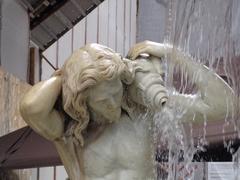 Close-up of the right Triton sculpture at Fontana dell'Amenano in Catania