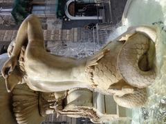 Fontana dell'Amenano Triton sculpture close-up in Catania