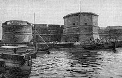 Michelangelo Fortress in Civitavecchia viewed from the harbor, historic woodcut artwork