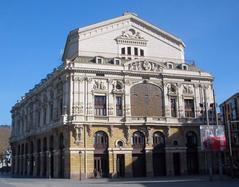 Teatro Arriaga theater building in Bilbao at dusk with illuminated facade