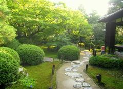 Shōren-in Buddhist temple entrance in Kyoto, Japan surrounded by lush greenery