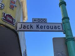 Jack Kerouac Alley street sign with green background and white text