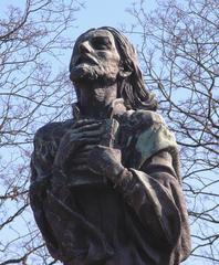 Monument of John Hus in Tábor detail showing his sculpted face and robes