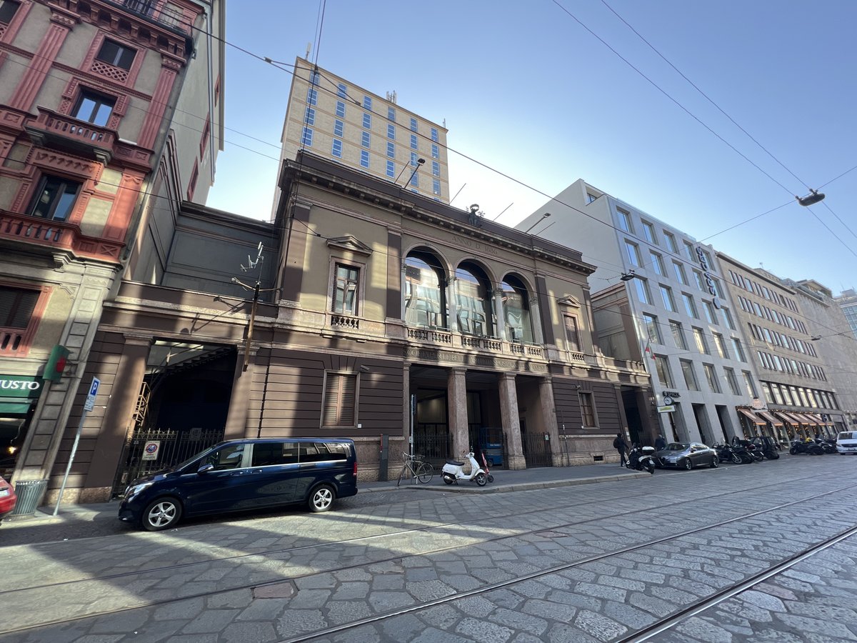 Front view of La Permanente building in Milan, Italy