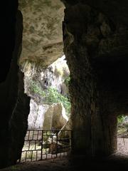 Ancient stone quarries called Latomie dei Cappuccini in Syracuse, Italy
