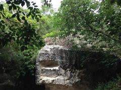 Ancient Latomie dei Cappuccini rock quarries in Siracusa with rugged landscape and historical significance