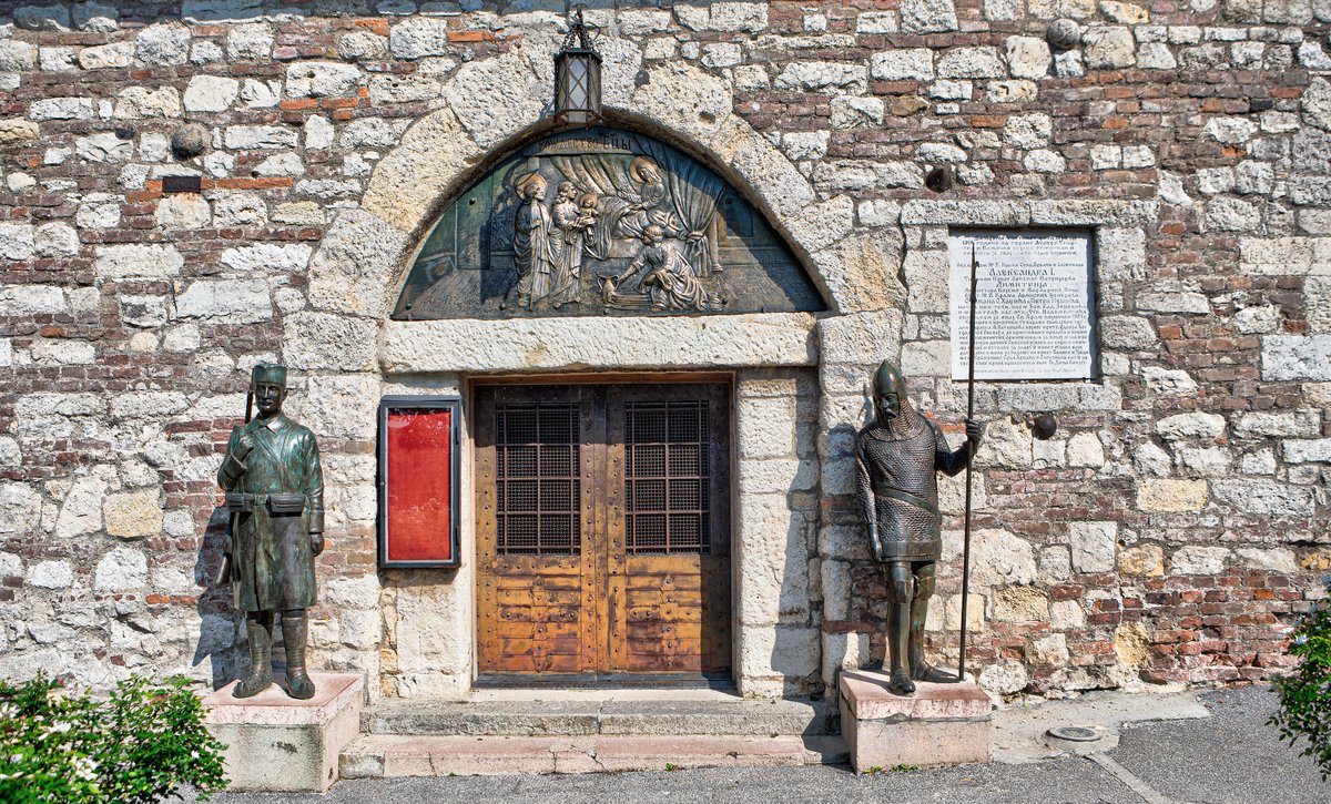 Ružica Church exterior with stone walls and arched windows
