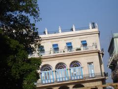 Scenic view of Havana, Cuba with colorful buildings and vintage cars