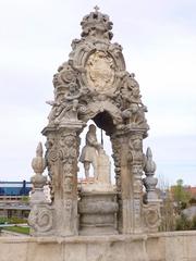 Puente de Toledo bridge in Madrid with river and historic architecture