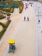 View of Ribera del Manzanares river taken from the historic Puente de Toledo bridge in Madrid, Spain