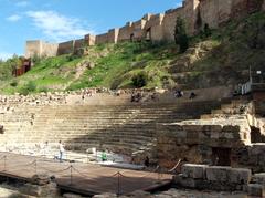 Roman Theater in Malaga at dusk with illuminated ruins