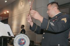 Percussionist Sgt. Matthew Craig Andrade performing on timpani at Jimmy Carter Library and Museum