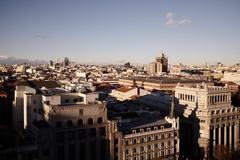 Panoramic view of Madrid city skyline with prominent buildings and clear sky