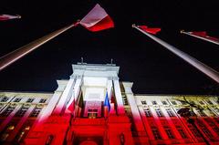 Polish Prime Minister's Office building decorated with national colors for Independence Day in Warsaw 2016