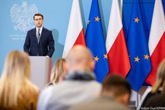 Polish government spokesman giving a press statement