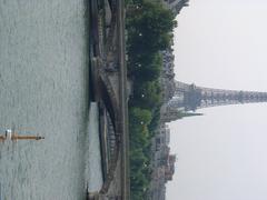 Bridge on the Seine river with calm water and blue sky on September 21, 2002