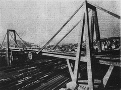Aerial view of the gigantic viaduct bridge connecting Camionale to the Genoa-Savona highway over the Valpolcevera valley in 1967