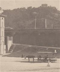Historic tram crossing Porta Saragozza square in Bologna late 1800s
