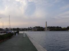 Scenic view of the Brindisi waterfront with sea and historic buildings