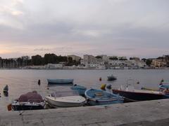 View of Brindisi Harbour with boats and waterfront buildings