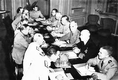 Historic photo of the Combined Chiefs of Staff meeting in Quebec on August 23, 1943 with Allied military leaders seated around a table