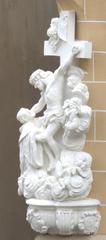 Detail of corner sculpture in Bamberg showing intricate stone carvings