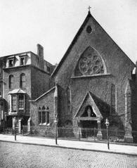 Historic black and white photo of early Saint Mary's church building at 228 West 45th Street from the 1880s
