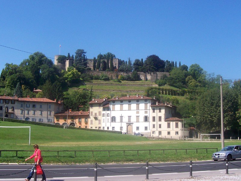 Scenic view of Piazzale della Fara in Bergamo with historical buildings and a clear blue sky