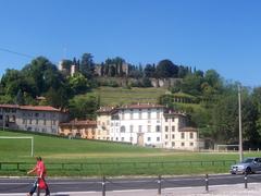Scenic view of Piazzale della Fara in Bergamo with historical buildings and a clear blue sky