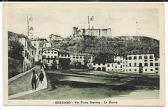 Street view of Via Porta Dipinta with La Rocca fortress in Bergamo