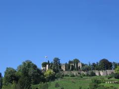 Rocca di Bergamo fortress on a sunny day with surrounding greenery