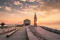 Scenic view of Caorle, Italy with colorful buildings along the waterfront