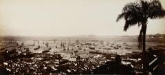 Vintage black and white photograph of La Saude neighborhood in Rio de Janeiro with historic buildings and street view