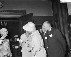 Queen Juliana of the Netherlands presenting the Golden Cotton Boll award at the Koninklijk Instituut voor de Tropen, Amsterdam, 1960