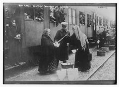 Red Cross canteen worker serving food in Ancona circa 1915-1920