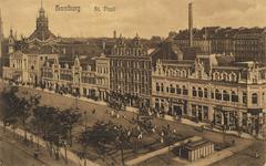 Street view of historic buildings in Hamburg with classic architecture and tram tracks