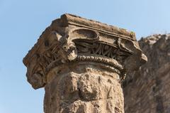 Ancient Roman capital in Pompeii Italy with carved acanthus leaves and volutes