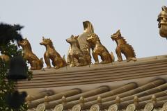 Jing'an Temple in Shanghai, China, with traditional Chinese architecture under a blue sky